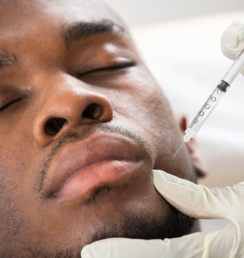 Man receiving injectables close up photo